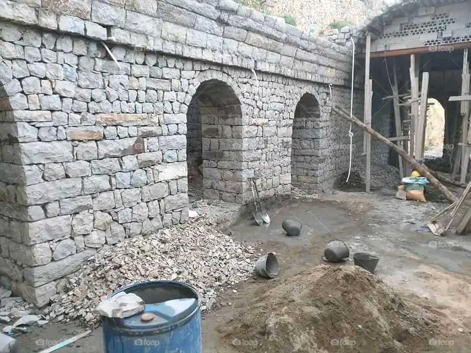 A stunning view of green mountains covered in fog in Yemen