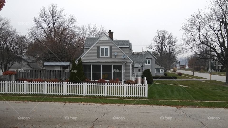 Gray houses awaiting the first snow of the year in small-town Indiana.