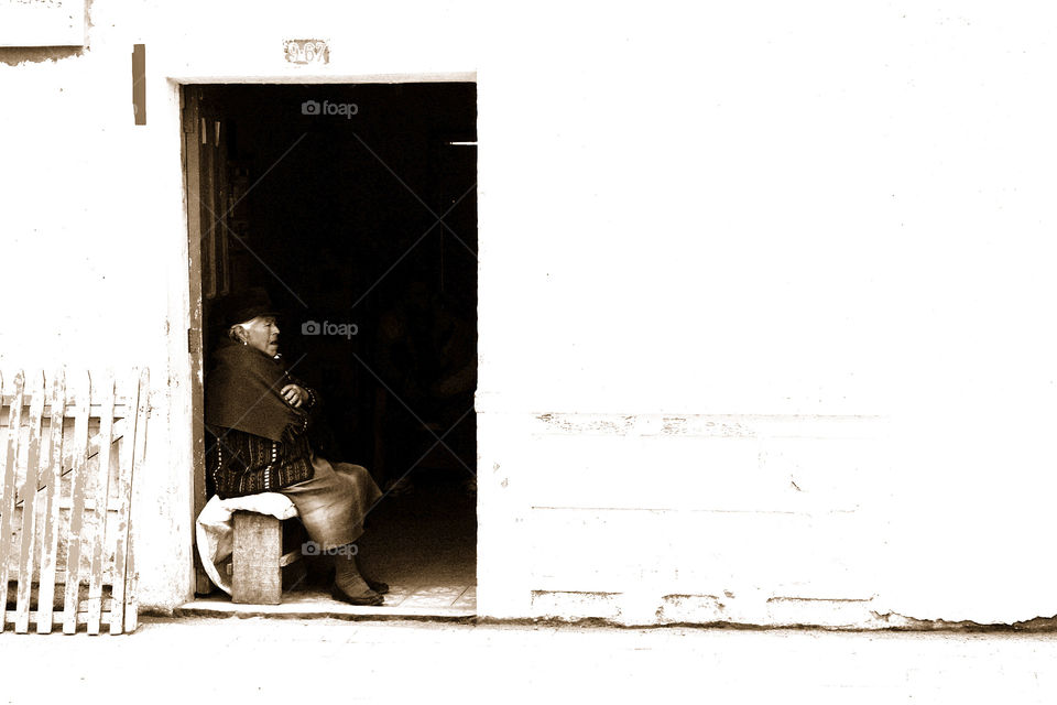 Old Woman in Doorway