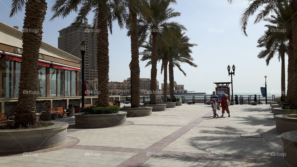 People's enjoy morning walk/ Surrounded by ocean/ restaurants and landscape