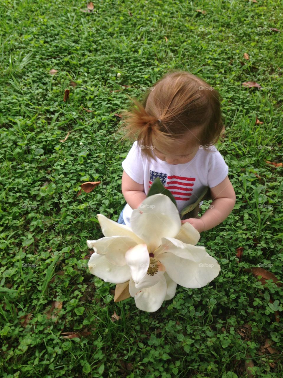 Little GirlWith Big Flower 
