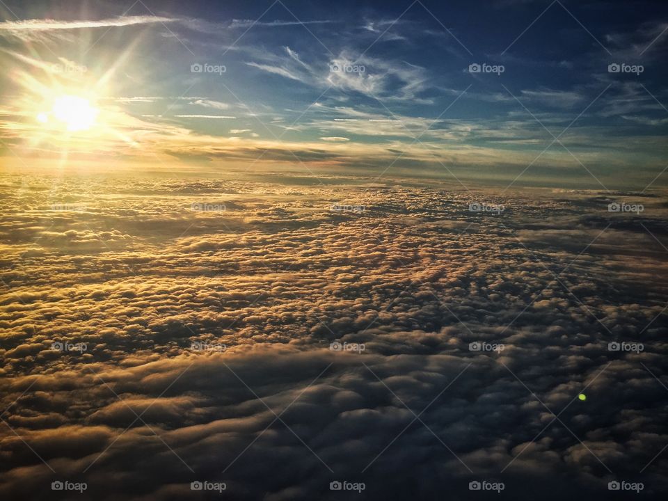Sunset above the clouds