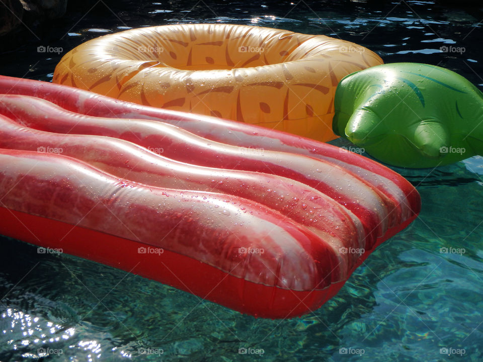 Bacon and pineapple pool floats