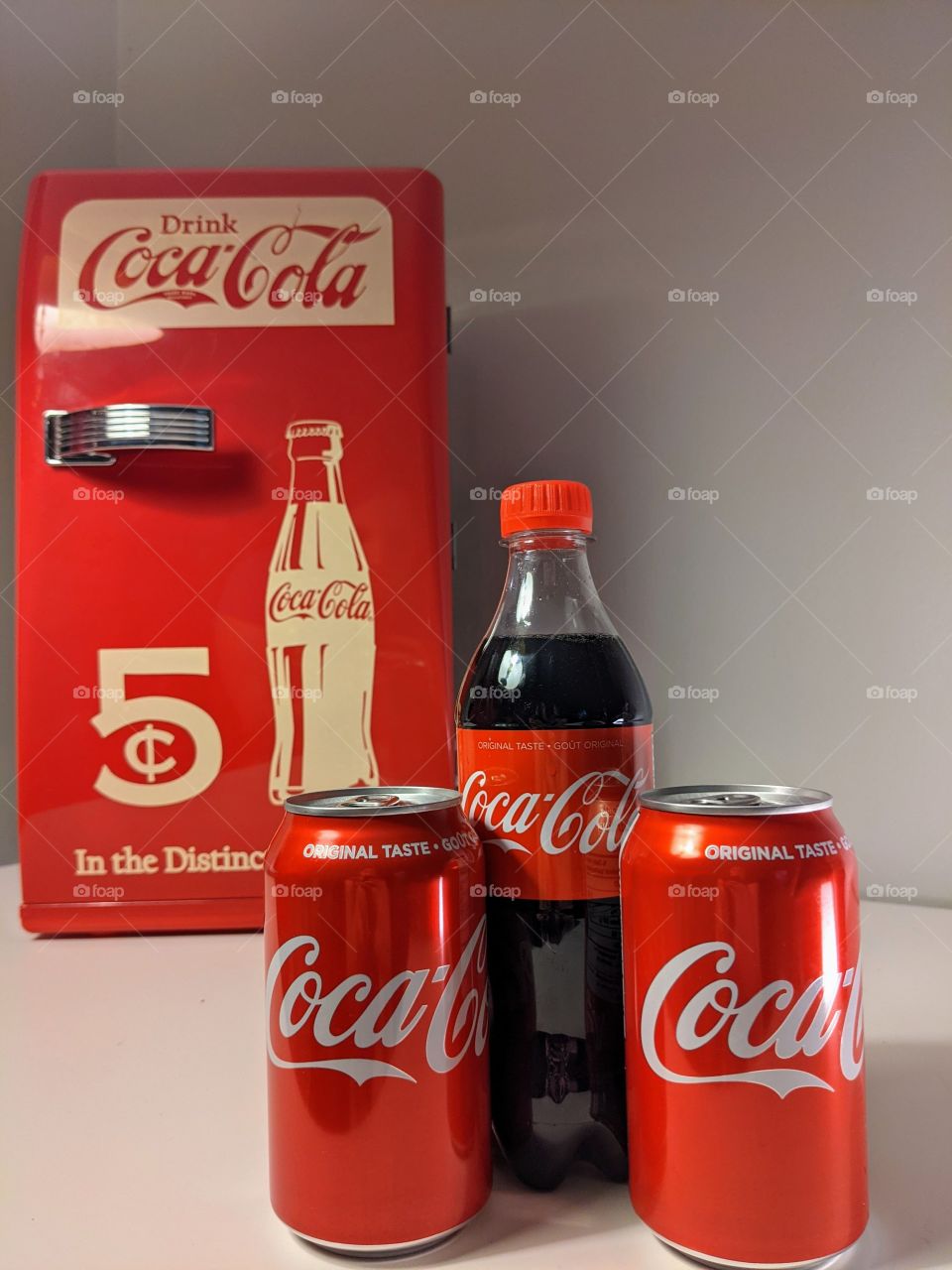 Coca-Cola mini fridge with Coca-Cola beverages