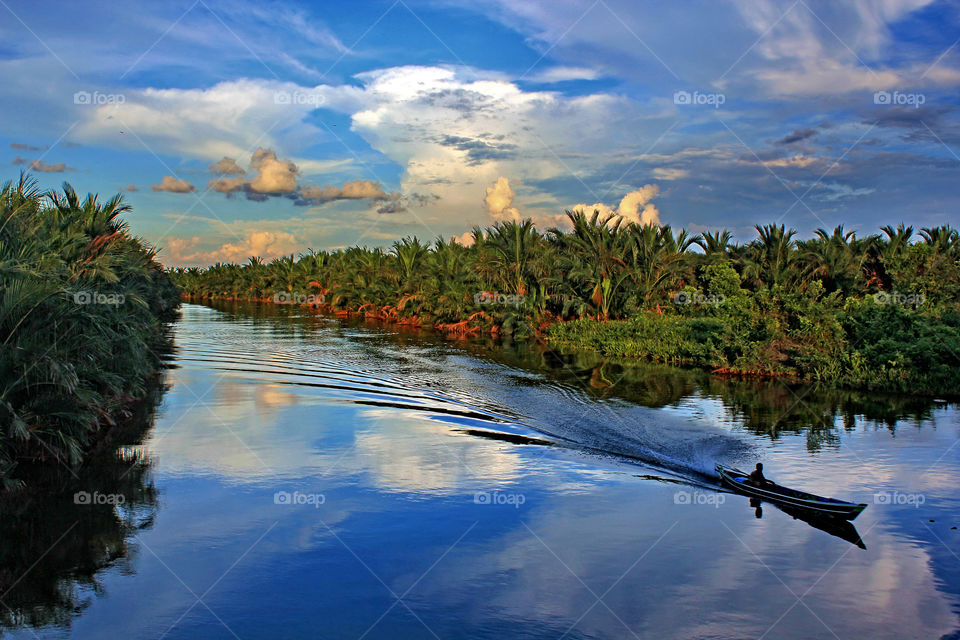 Spring afternoon scenary in the city of a thousand rivers, the blue sky looks very beautiful. Banjarmasin, South Borneo, Indonesia.