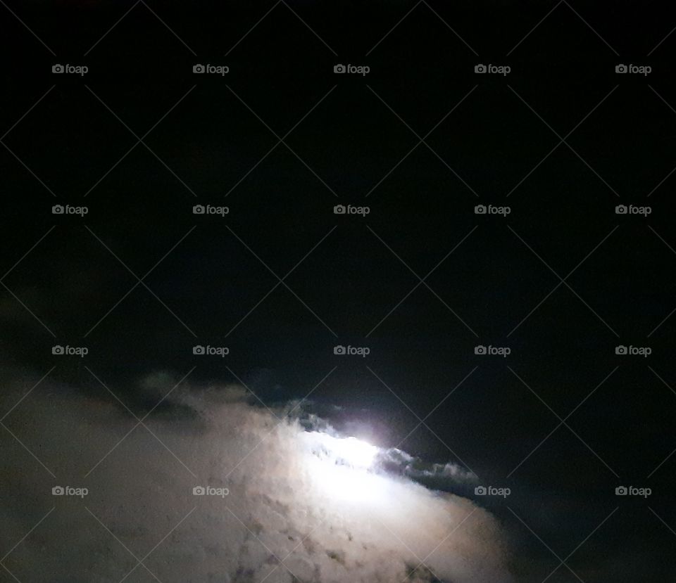 Moon  between clouds, shining,evening,night,colorful,nature,landscape,sky,cloudy,black