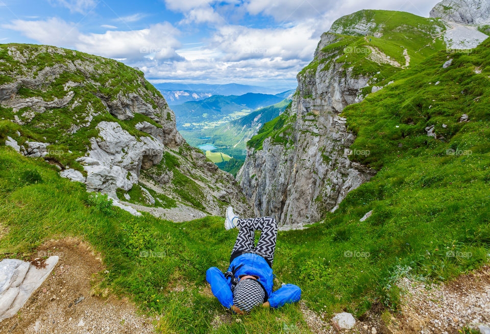 High angle view of a woman lying on grass