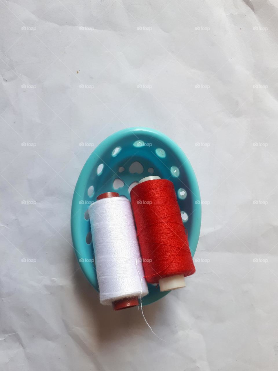 round mini basket as a container for storing yarn
