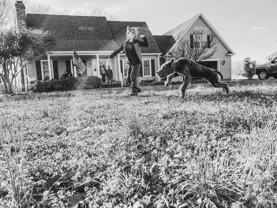 A boy and a dog 