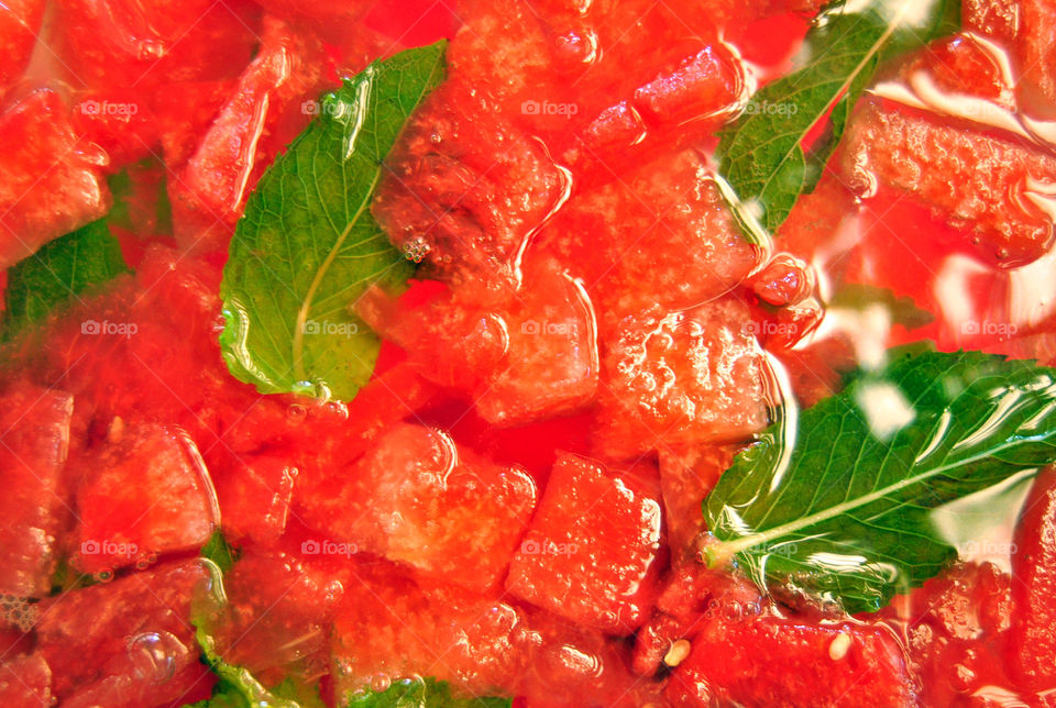 flat lay, top down of watermelon and mint infused water