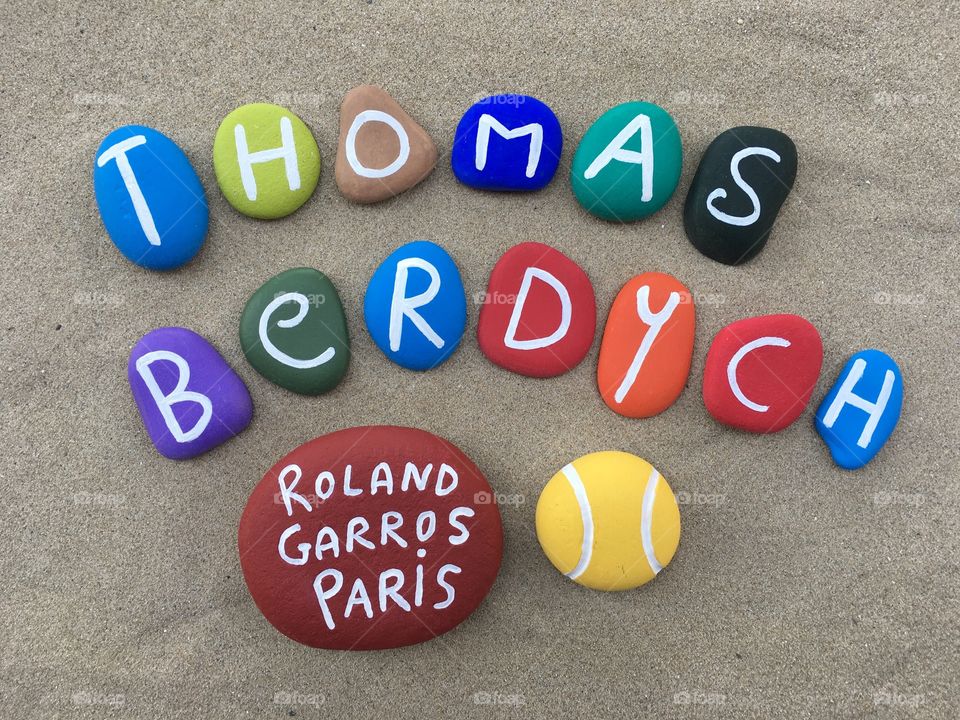 Thomas Berdych, czech tennis professional player at Roland Garros, souvenir on colored stones 