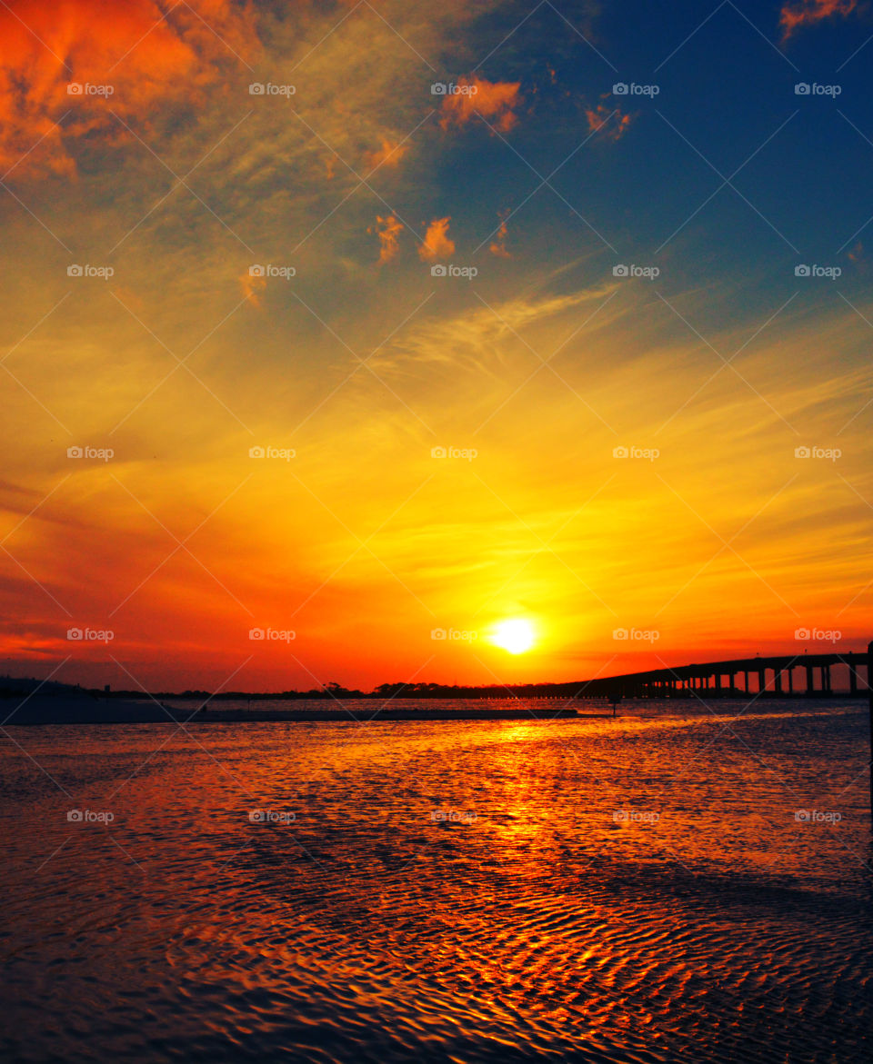 View of calm sea at sunset