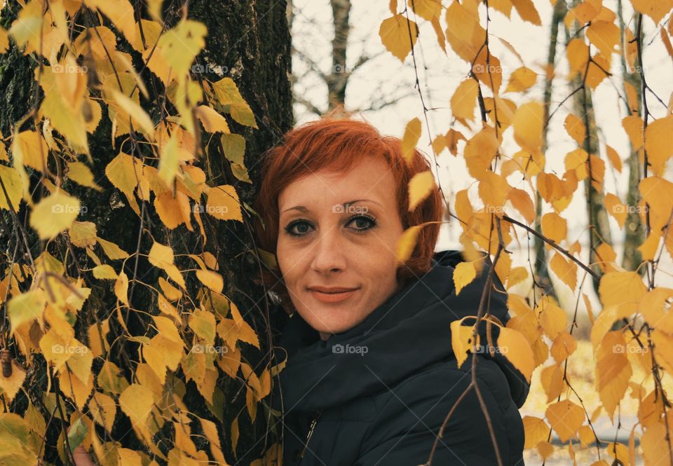 Portrait of woman in autumn