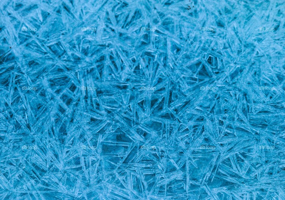 texture of blue cracked ice in extreme cold... zoomed in