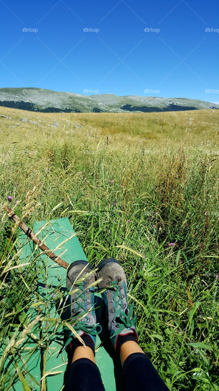 boots and grass