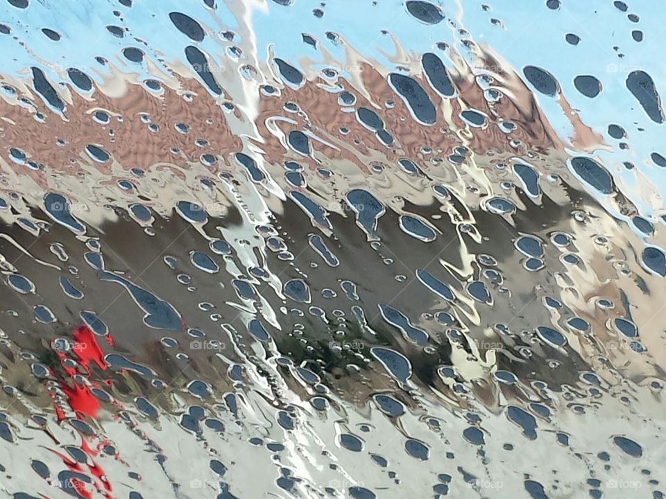 Abstract view from inside car during carwash