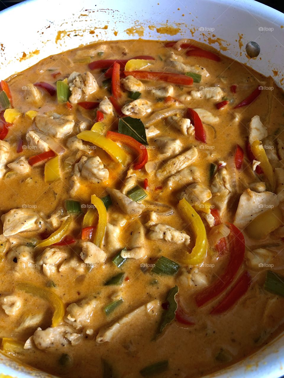 Delicious coconut chicken with vegetables.