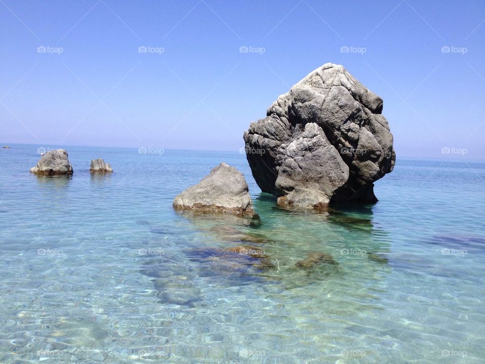 View of rock in sea