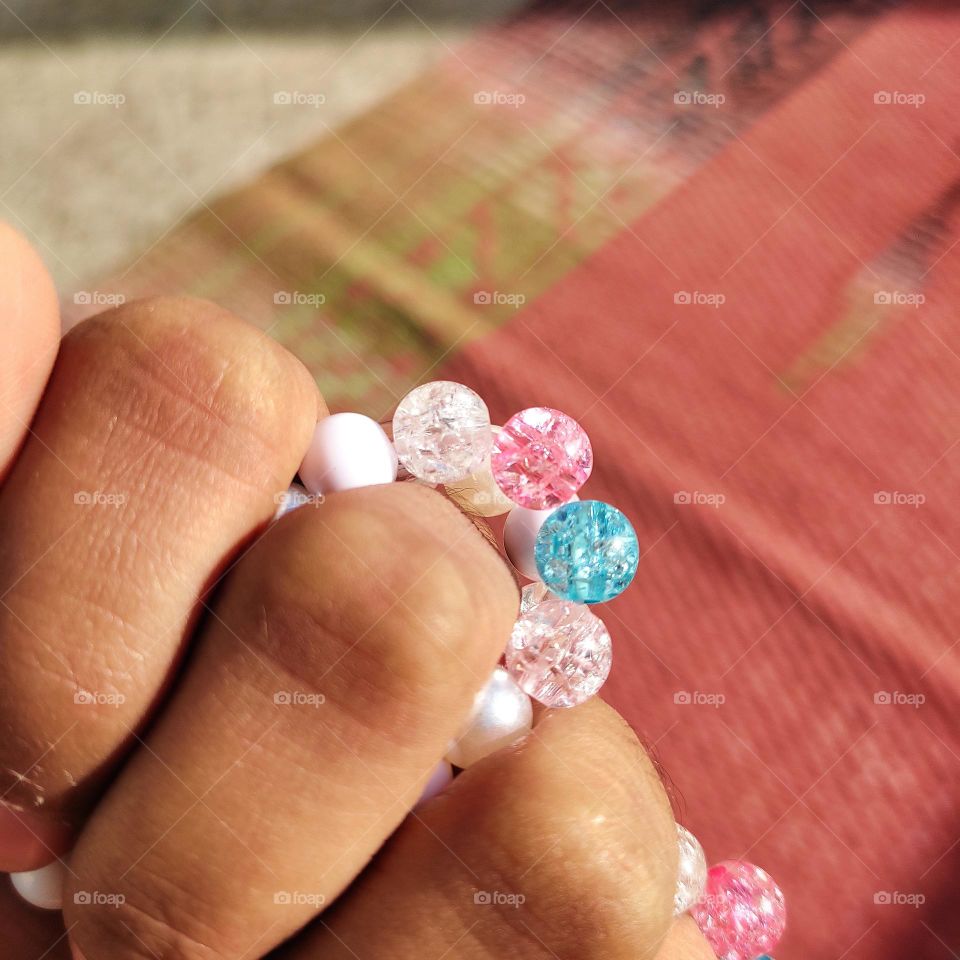 beads on fingers
