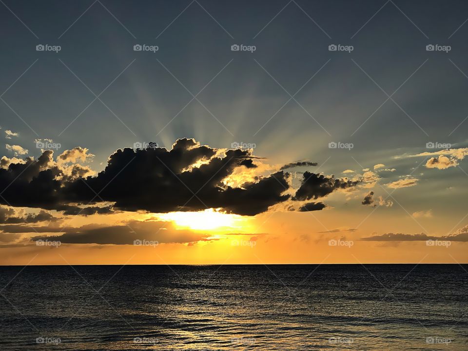 Sunburst over the ocean.