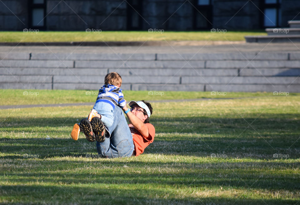 Father and son playing in the park