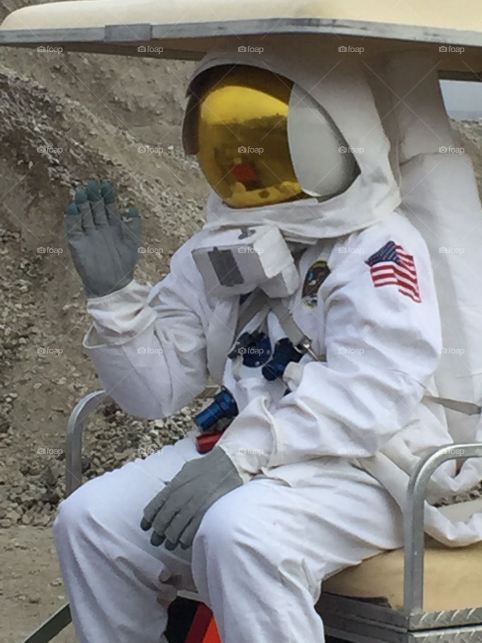 Astronaut in the golf cart parade