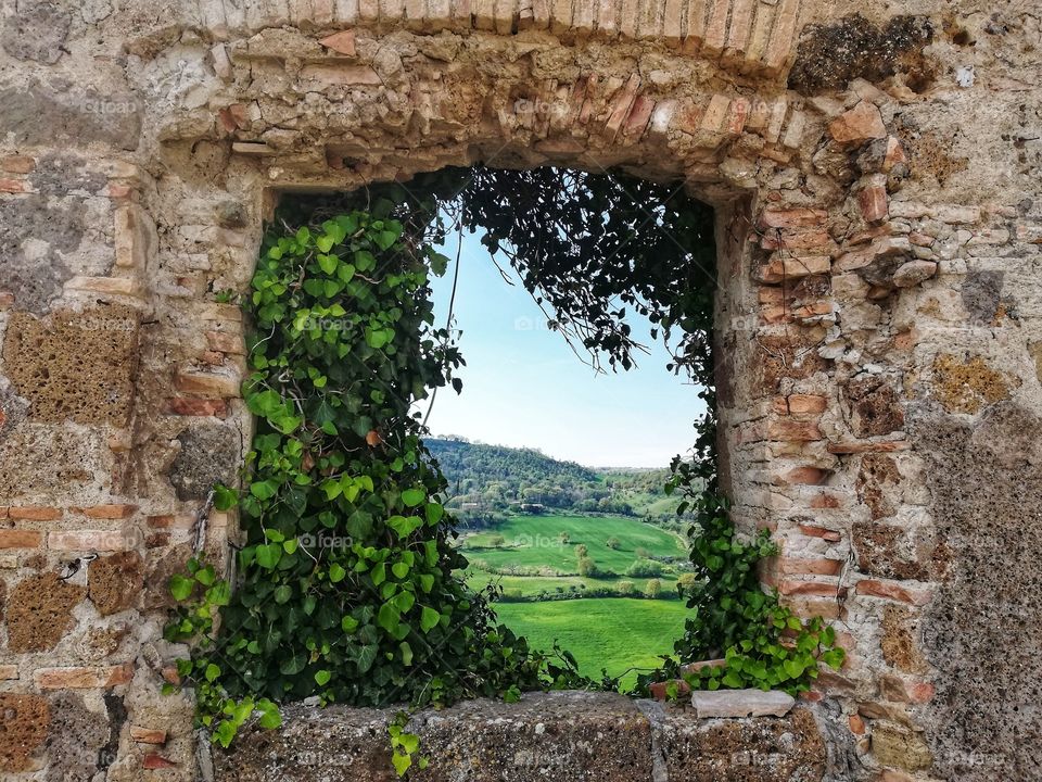 window on the hills of Tuscia Viterbese in Lazio (Italy)