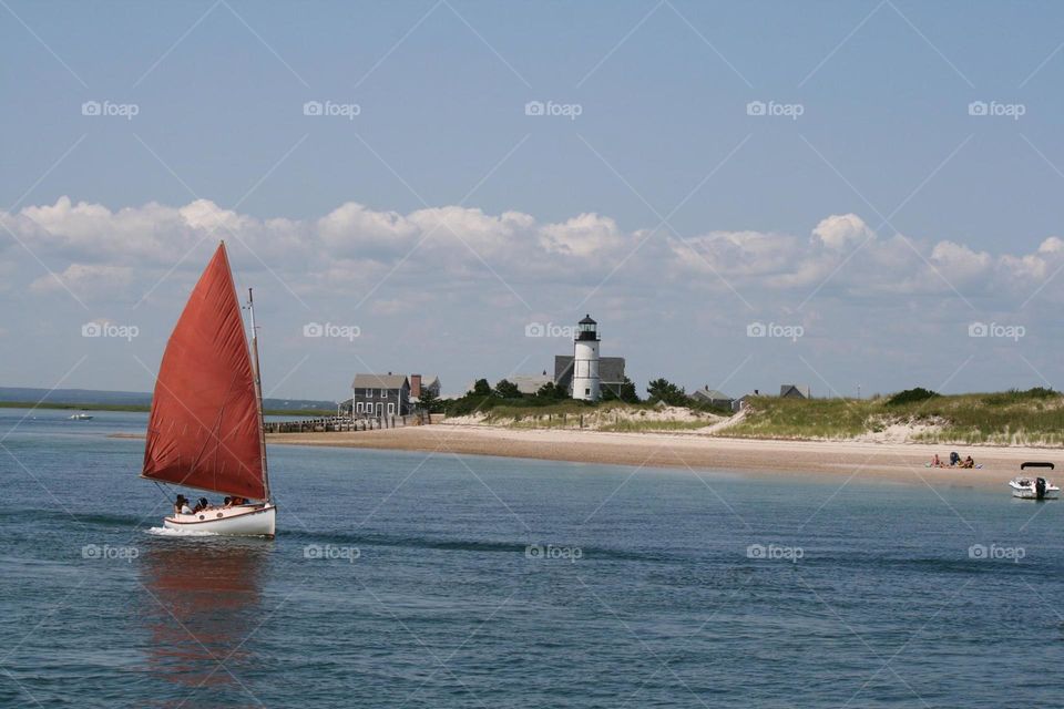 Lighthouse and Sailboat