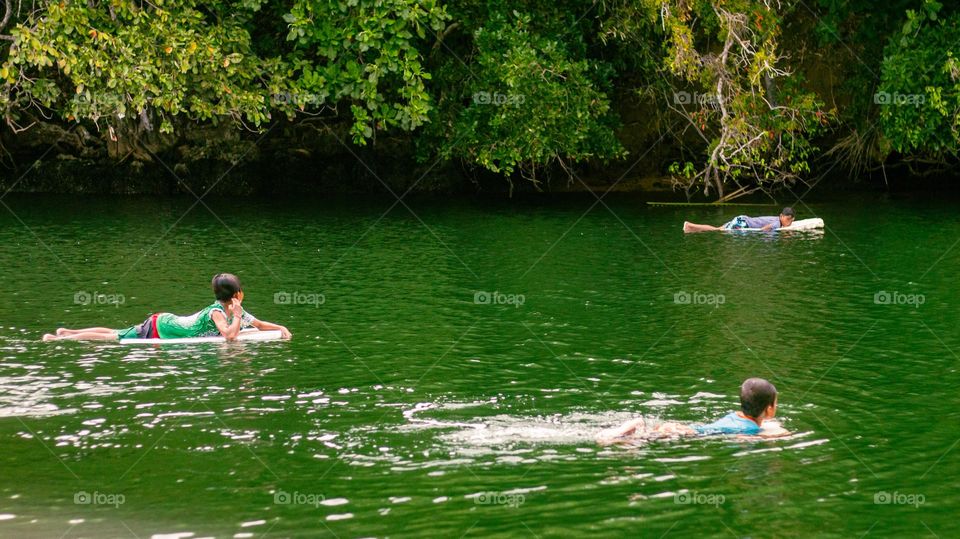 kids swimming in the waters