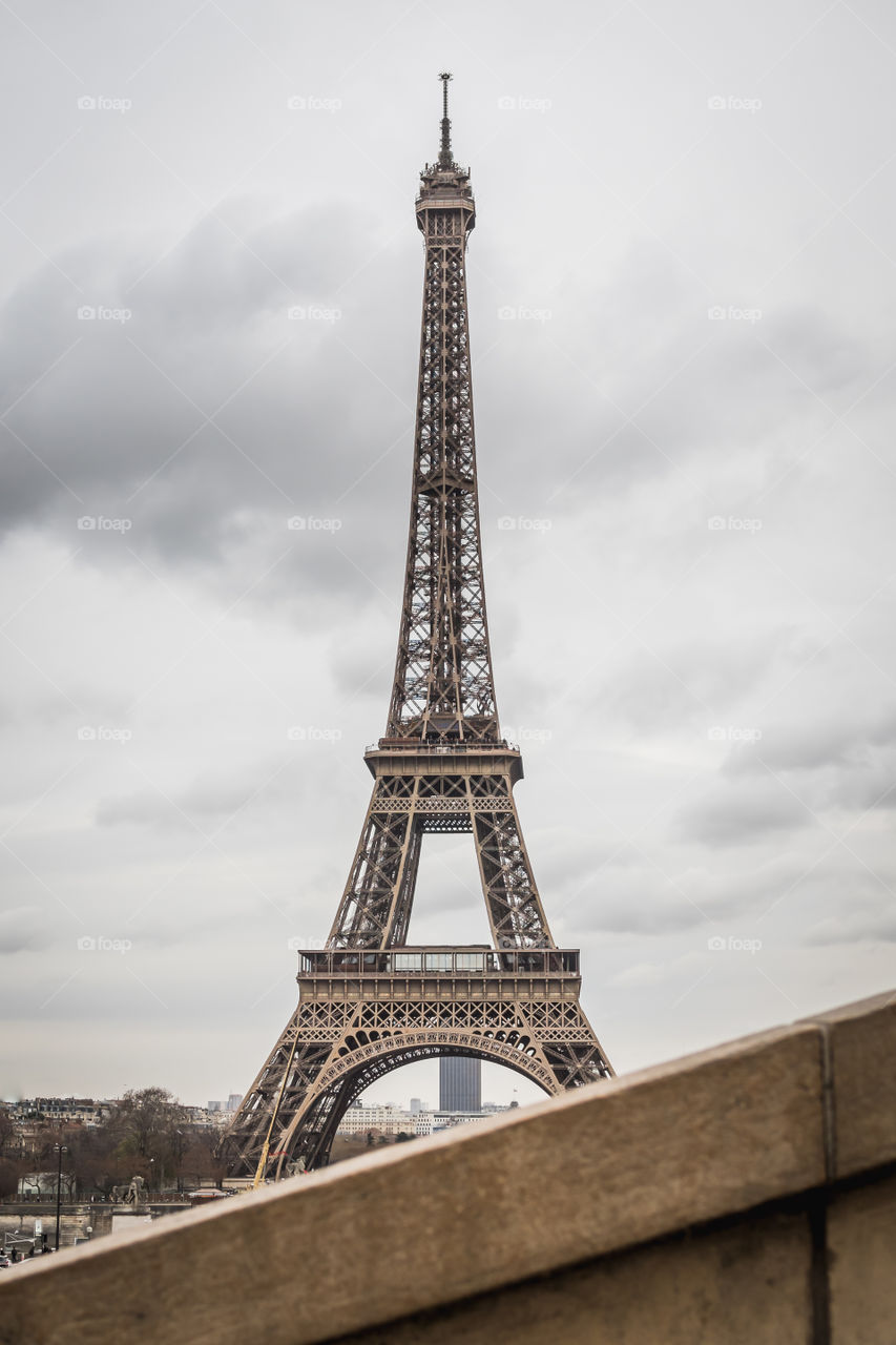 The Eiffel Tower under a Parisian stormy sky