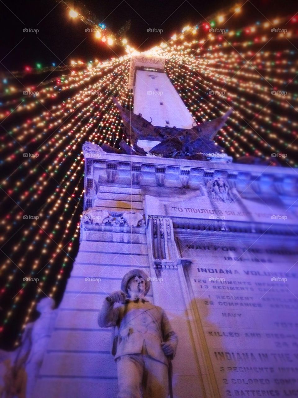 Looking up at the lights at monument circle in Indianapolis Indiana.