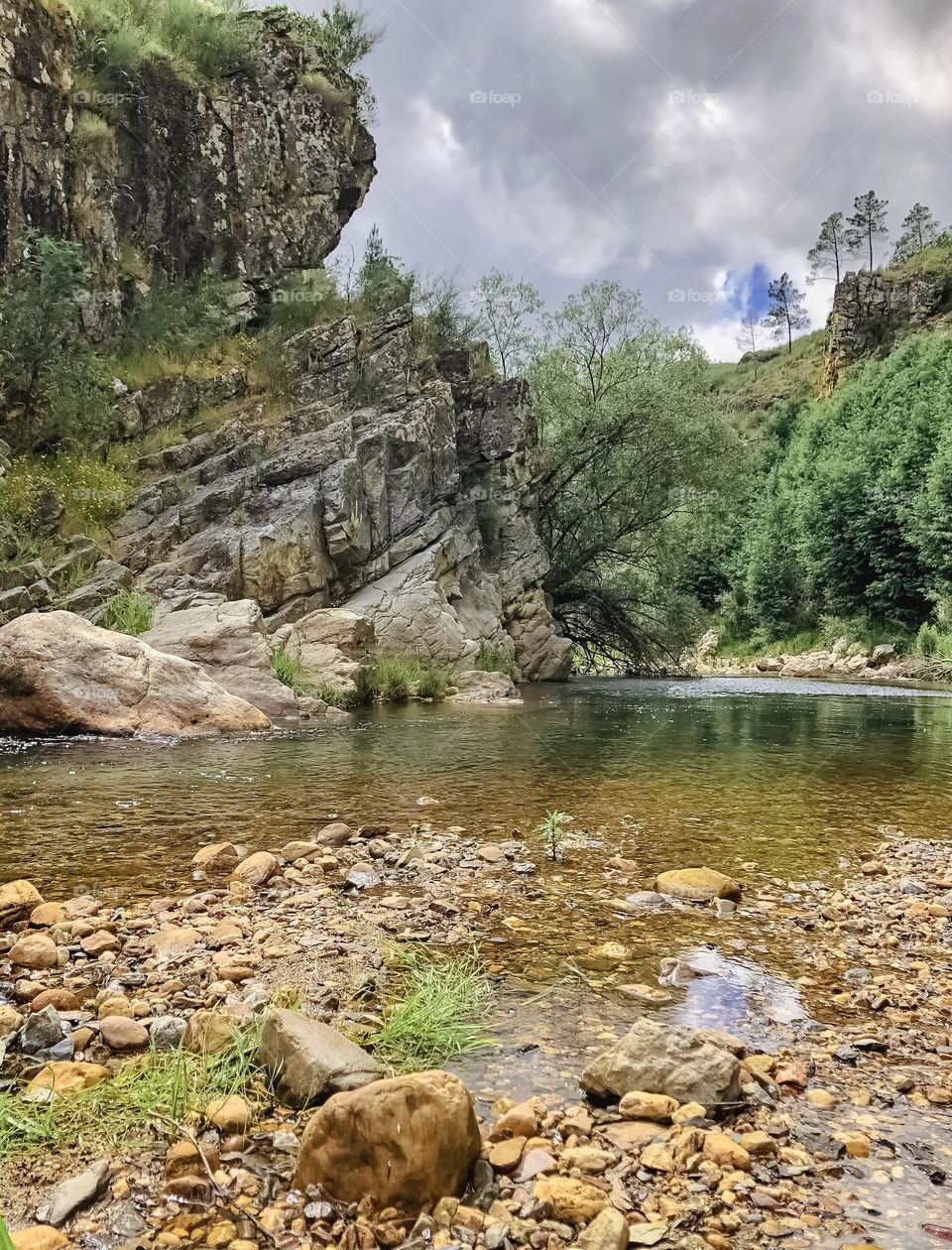 The river winds past rocky cliffs at Penedo Furado, Portugal 