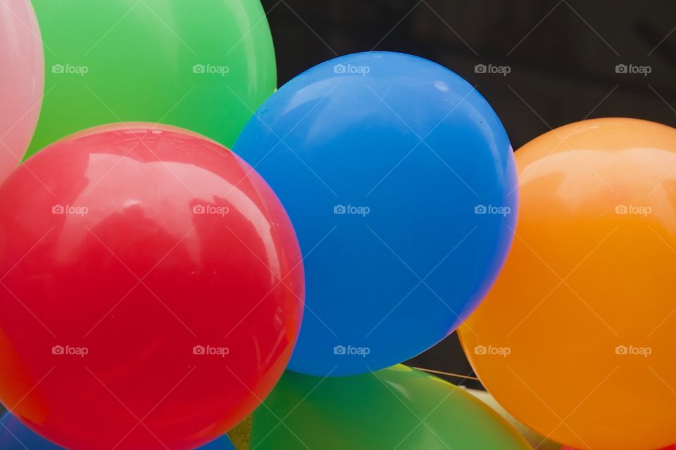 A bundle of colored inflated balloons on a float at the Annual Dance Parade, New York City.