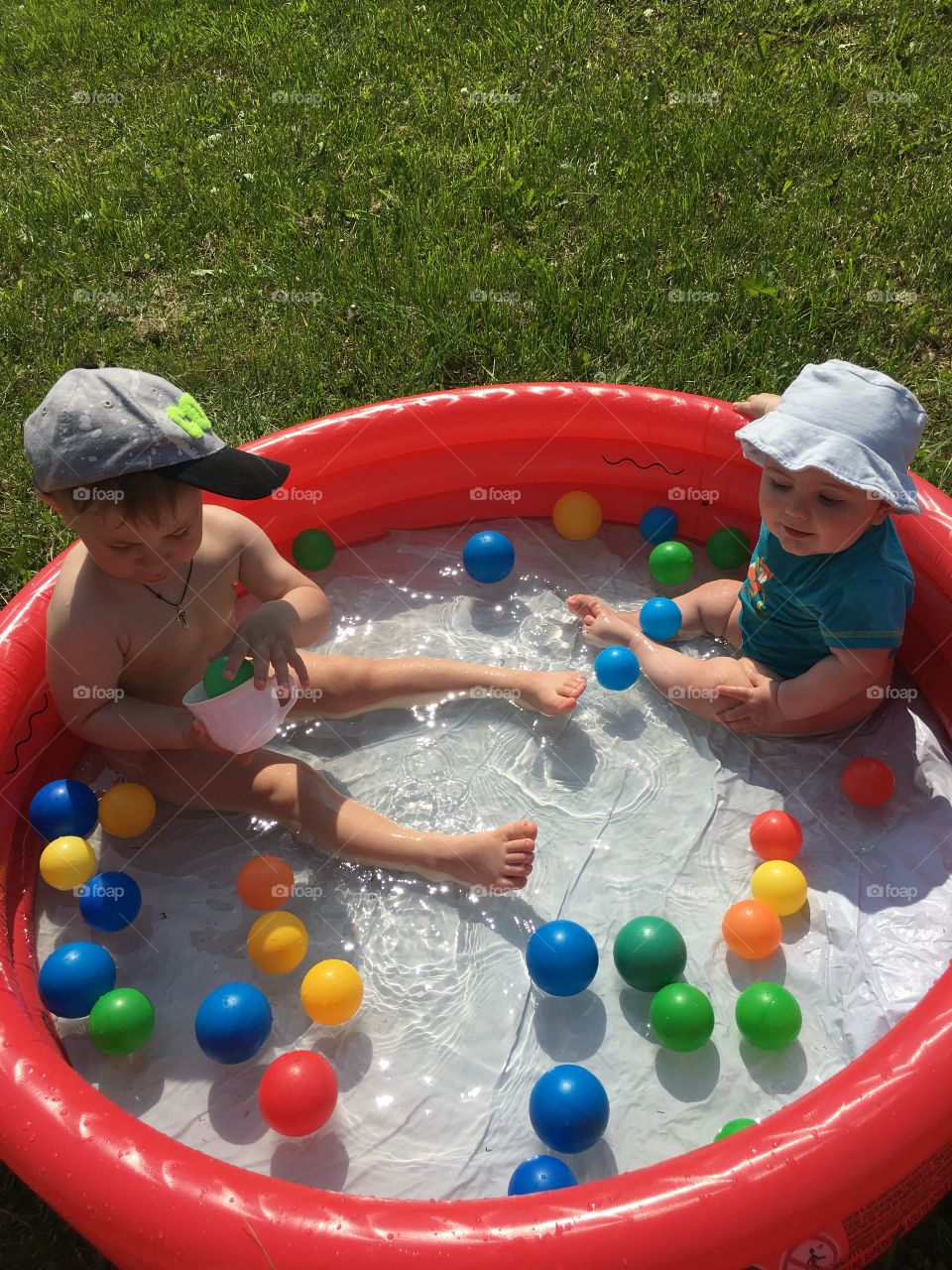 children swimming in the pool