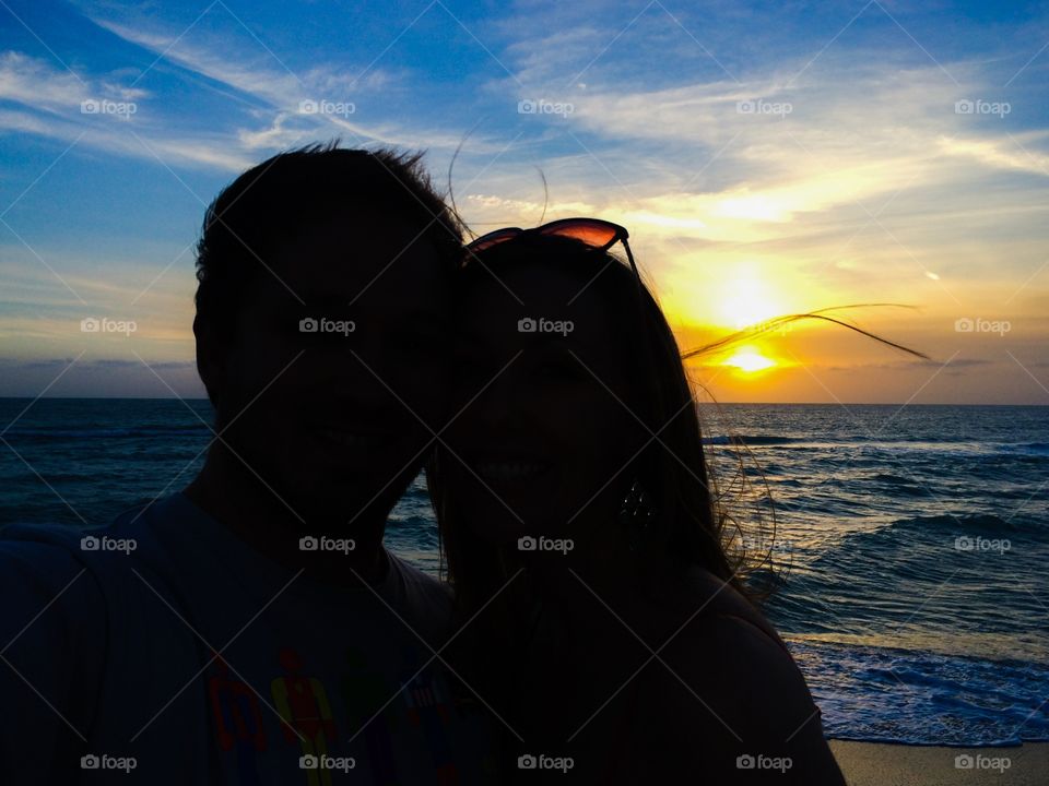 Sunset love. My love & I with the sunset on the beach. Priceless. 