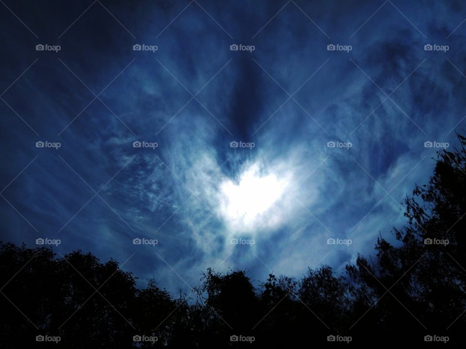 dark sky between sun