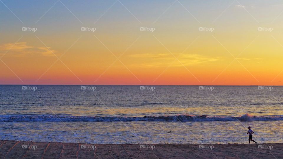 Man jogging at the beach