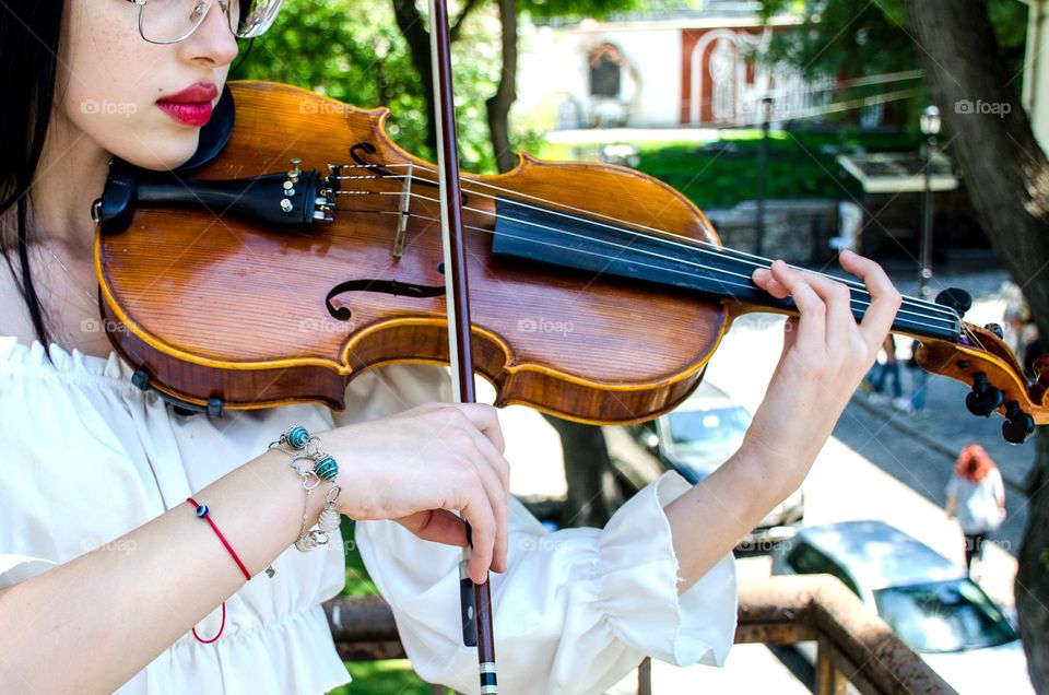 Young Woman Playing Violin