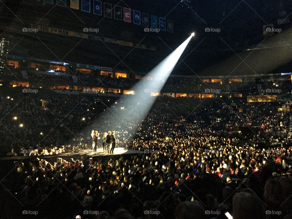 Large Music Concert with Lit Up Phones in the Crowd 2