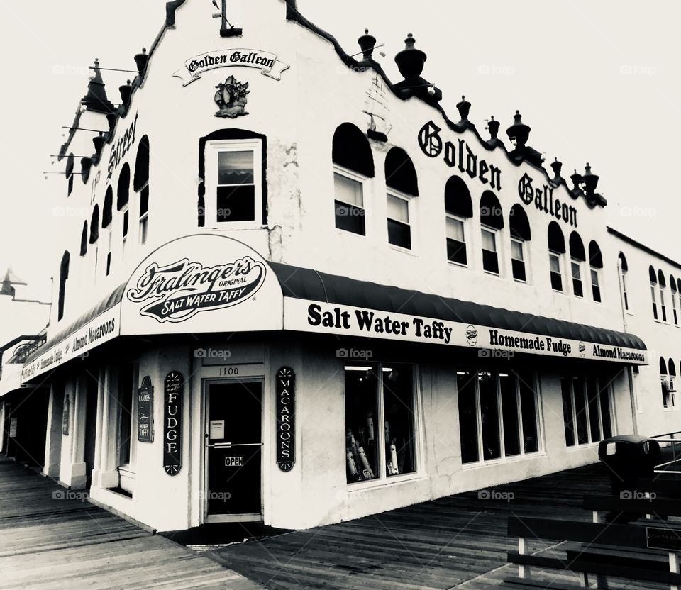 Salt water taffy shot on the ocean city boardwalk on an overcast day. Shot in black and white with high contrast. 