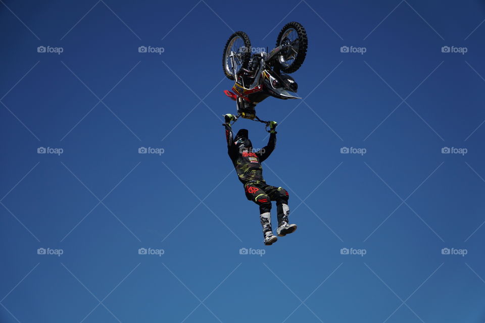 Stunt rider performing on a motorcycle