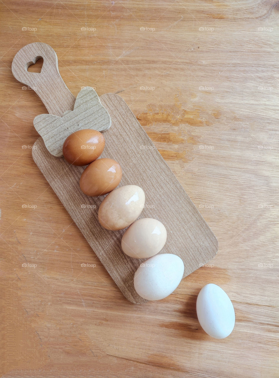 Eggs on wooden table