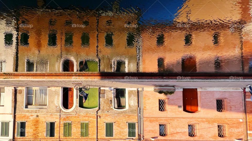 Cityscape reflection on water 