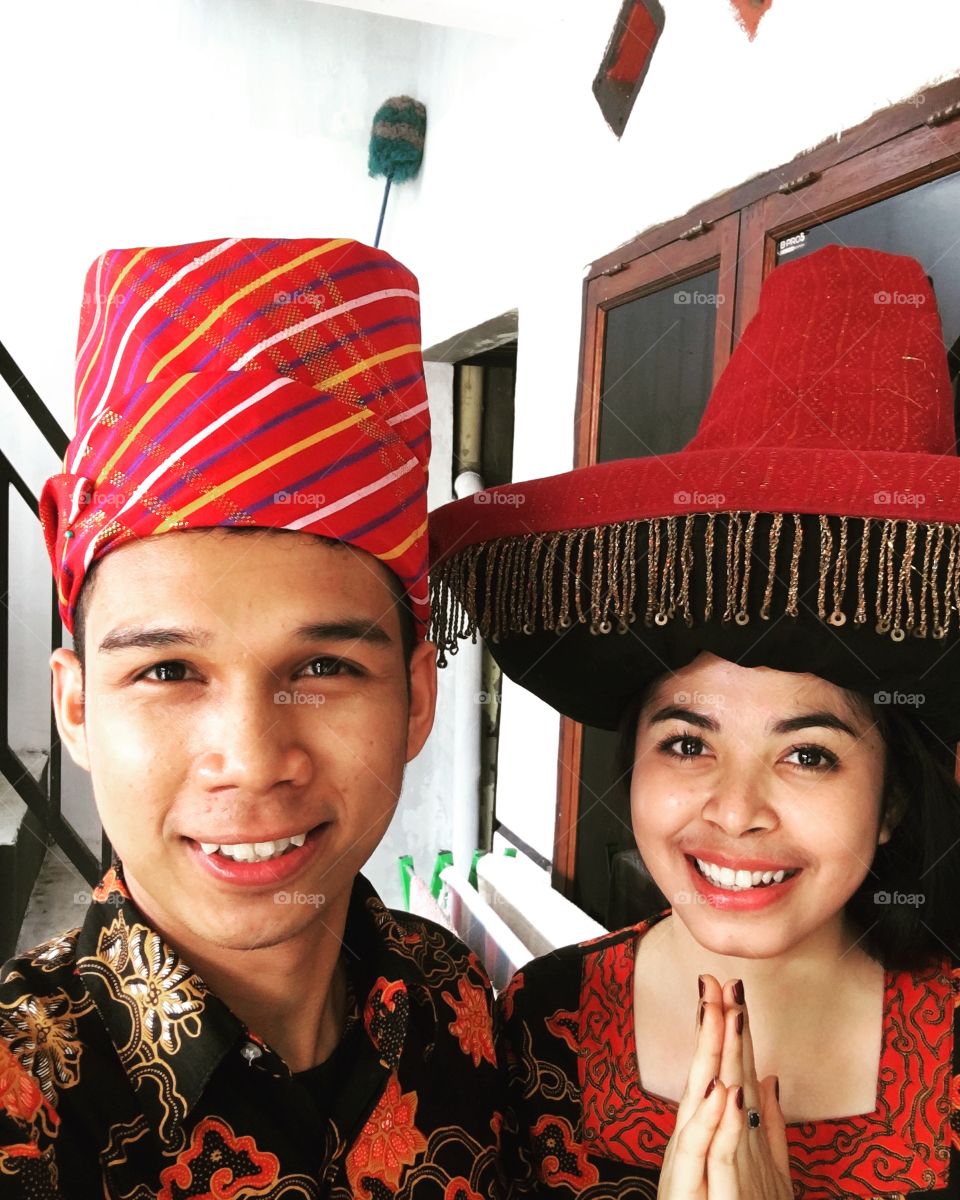 clothing indigenous tribe bataknese, the name is wis nipes(man) and tudung (girl)