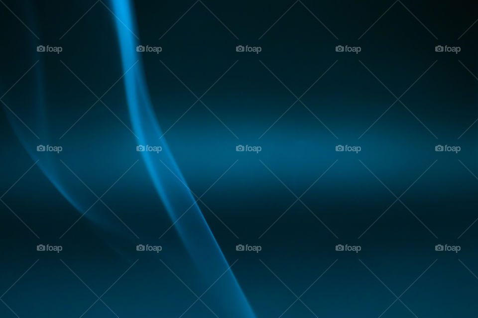 Smoke scented candles on a black background