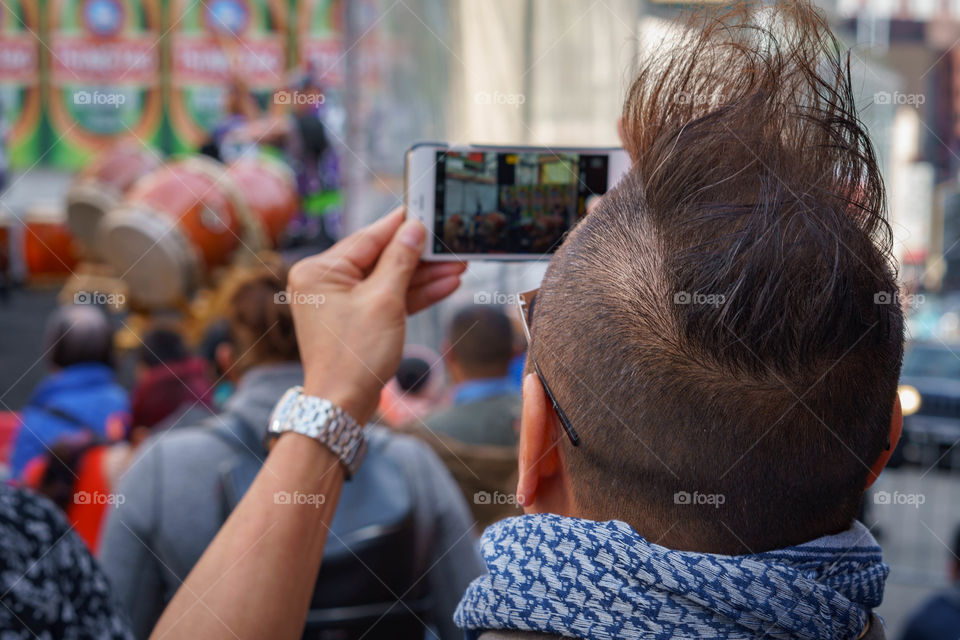 Mohawk Guy Taking a Picture