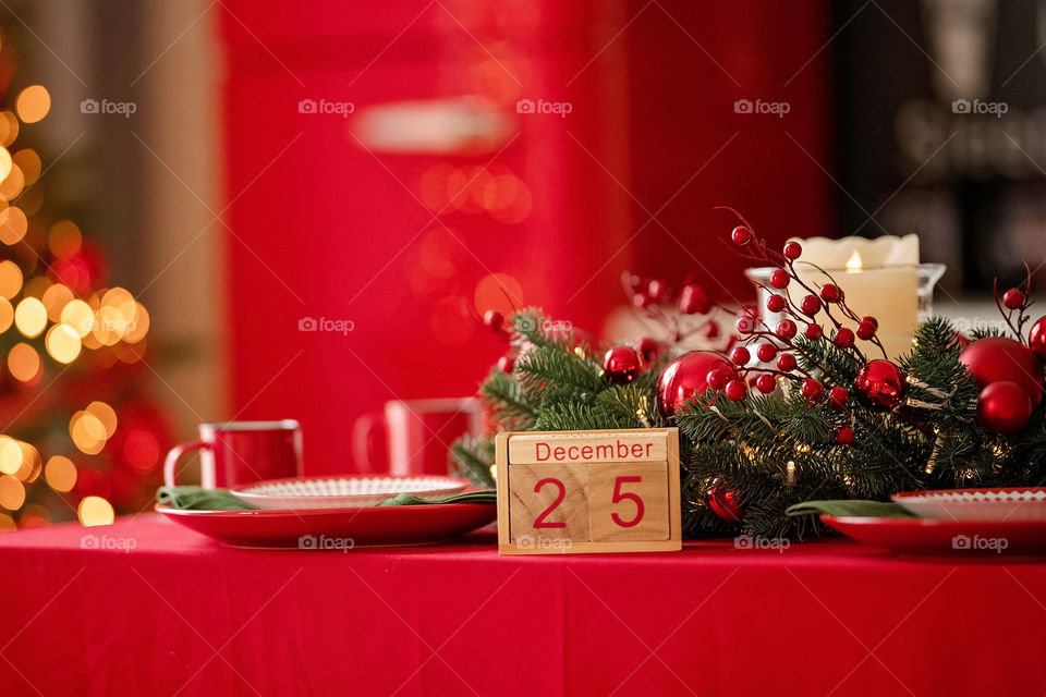 Christmas background with wooden block calendar with the date of December 25