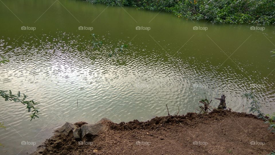 reflection of hill in water