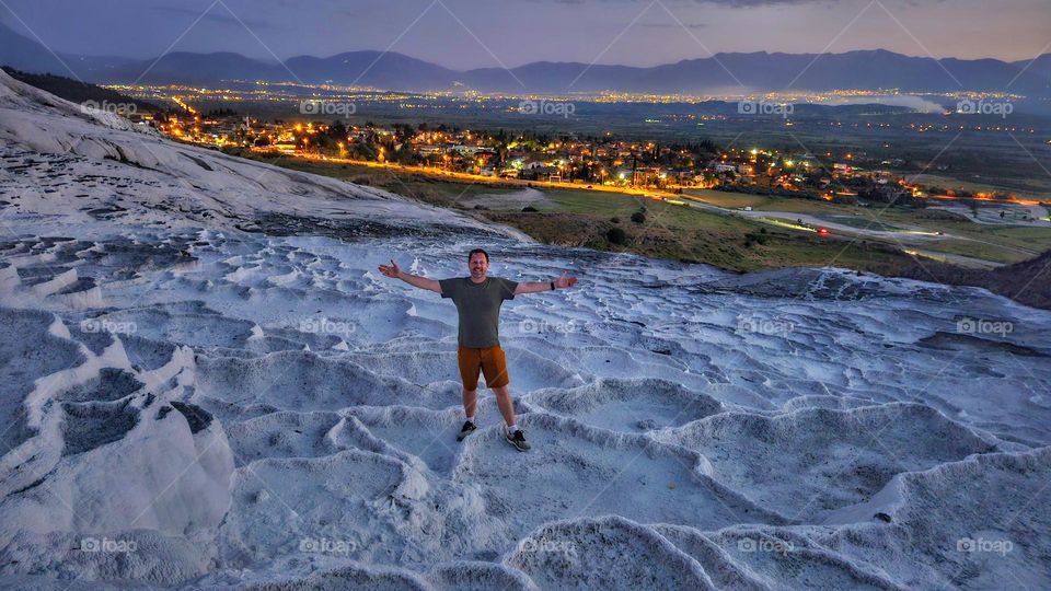 standing on mineral deposits at sunset