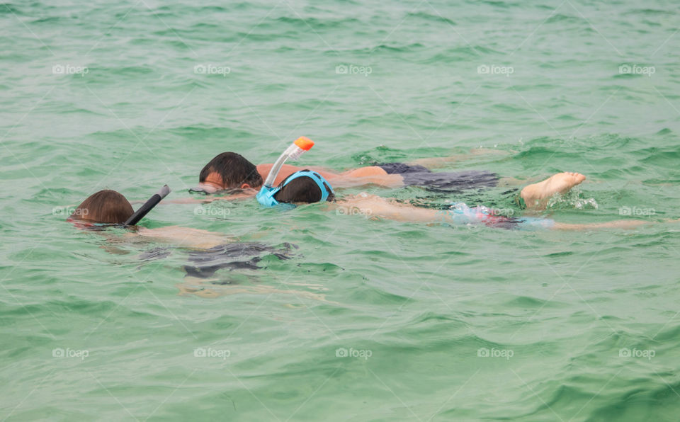 Snorkeling together as a family